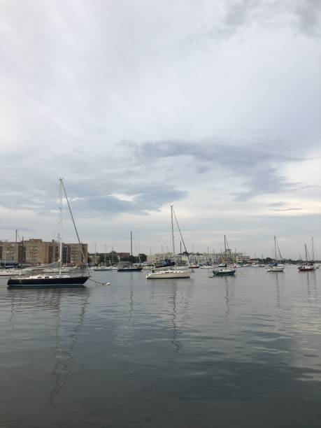 istock Cloudy Sunset in August at Sheepshead Bay in Brooklyn, New York, NY. 1264009917