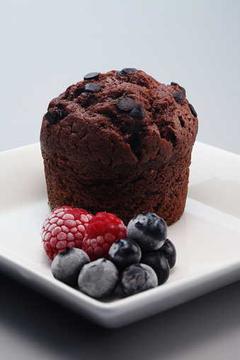 Chocolate chip muffin with berries