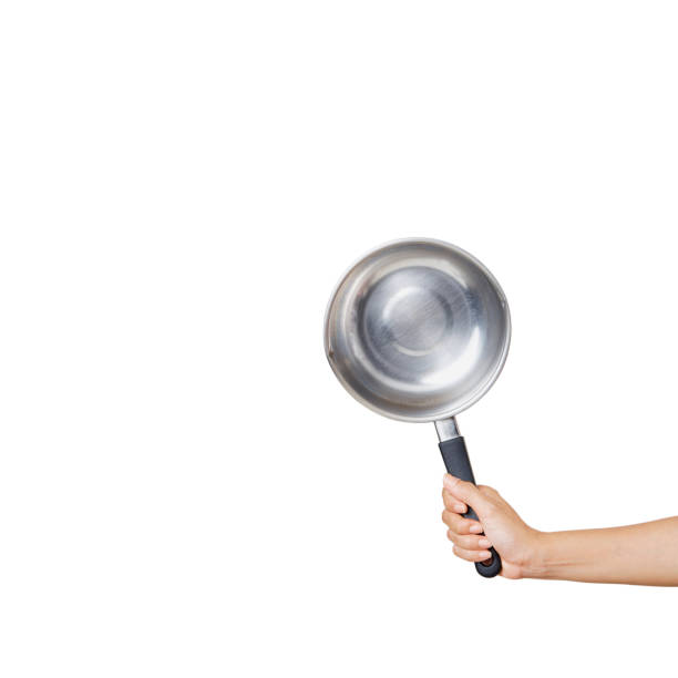 istock Woman holding saucepan for cooking classes on white 1264013274
