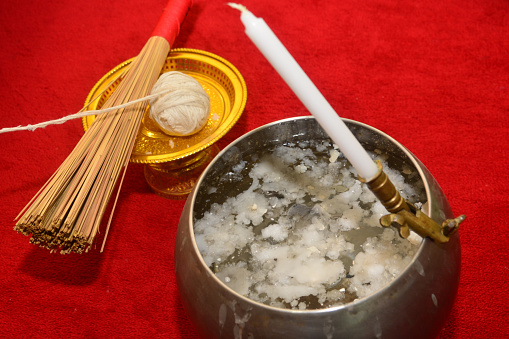 Sacred cord and Holy water in Buddhism Religious Ceremony, note  select focus with shallow depth of field