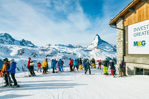 Lots of people skiing on a track on the Hochzillertal mountain, Tyrol, Austria