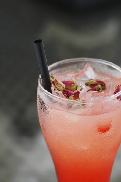 A glass of cocktail with Roselle