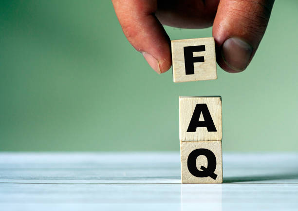 istock The hand puts the cube block with the inscription FAQ. FAQ concept and background. 1264020083