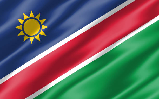 istock Silk wavy flag of Namibia graphic. Wavy Namibian flag 3D illustration. Rippled Namibia country flag is a symbol of freedom, patriotism and independence. 1264028443