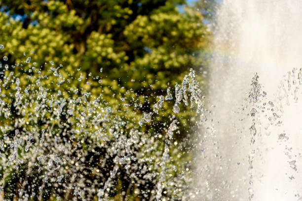 istock Selective focus on spray of urban fountain and blurred background 1264046133