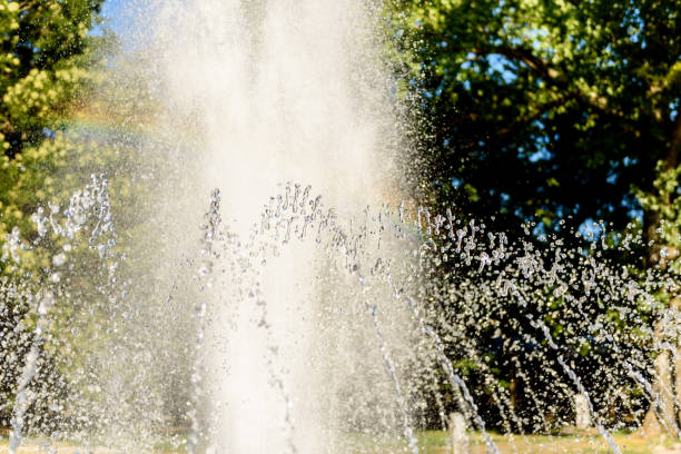 istock Selective focus on spray of urban fountain and blurred background 1264046145