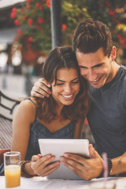 istock Checking pictures together on a tablet 1264052098