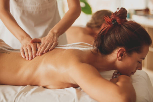 istock Woman enjoying a back massage with her eyes closed 1264054307