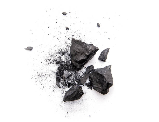 istock Pieces of broken black coal isolated on white background 1264055104