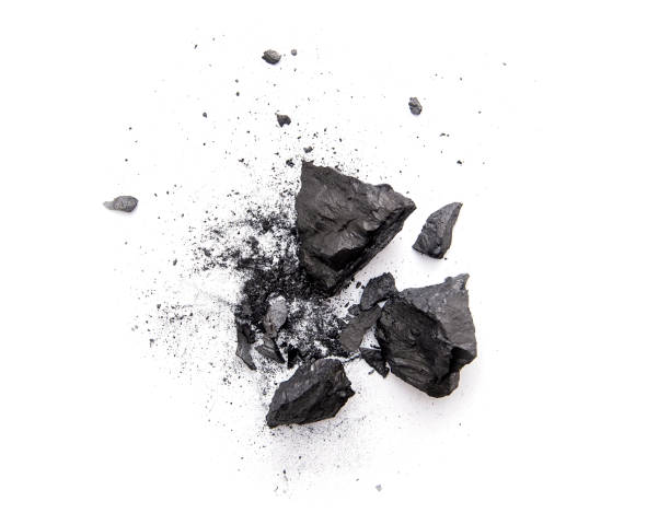 Pieces of broken black coal isolated on white background Pieces of broken black coal isolated on white background coal stock pictures, royalty-free photos & images