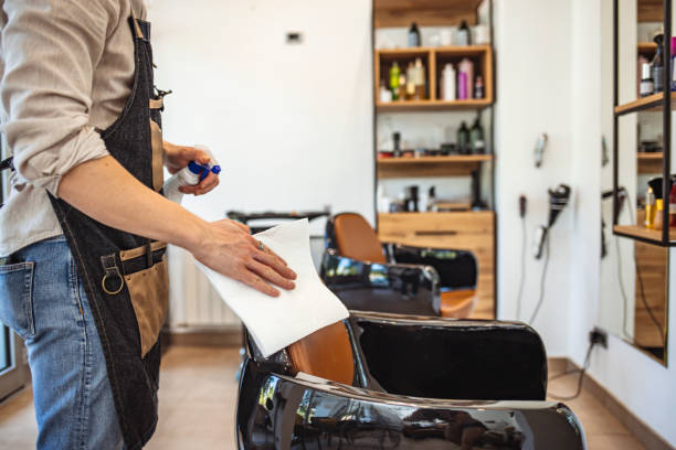 istock Hair stylist disinfecting work space. 1264056063