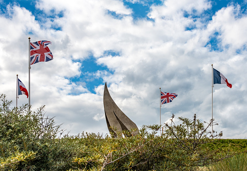 WII Memorial with UK and French Flags in Ouistreham, France