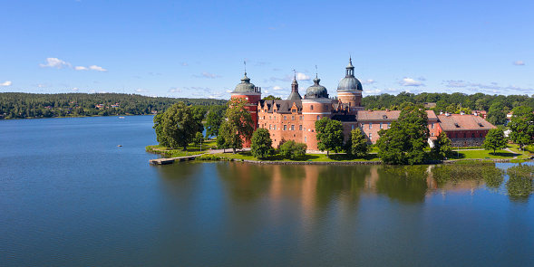 Aerial view of Gripsholm Castle (in swedish; Gripsholms Slott) at Lake Mälaren in the Södermanland county of Sweden. The construction of Gripsholm Castle was initiated in the 16th century. Today it houses the national portrait gallery, and is  one of the twelve royal castles of Sweden.