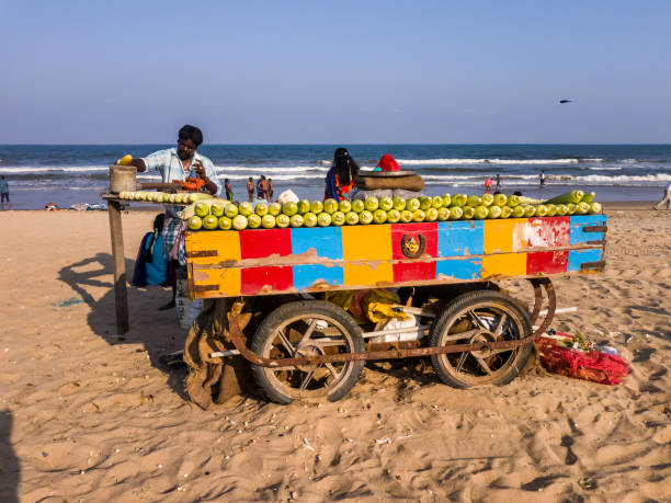 Chennai, Tamil Nadu, India - January 2020: A colorful street food cart selling roasted corn on the Besant Nagar beach in the city of Chennai.