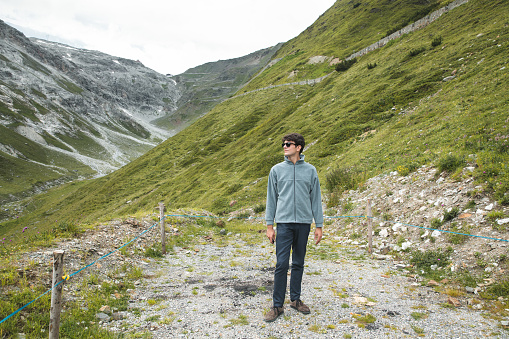 Long winding road at the last part of the Stelvio Pass seen from the top