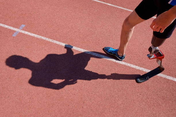 istock Adaptive sportrsman running on track 1264062611