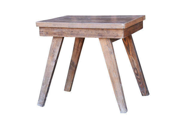 istock Old wooden table isolated on white background 1264062785