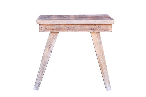 istock Old wooden table isolated on white background 1264062798