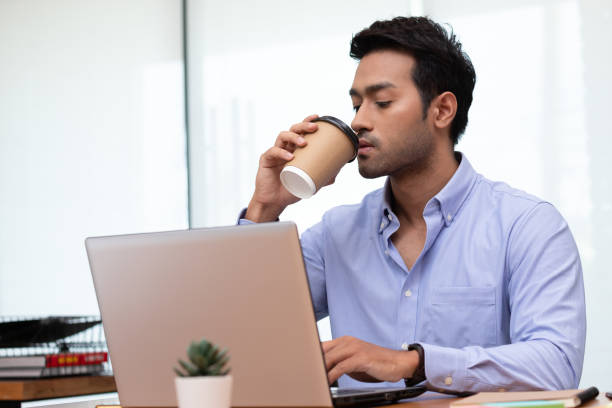 istock Business man working and drink coffee in morning. 1264064757