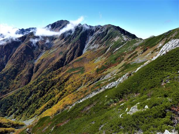 Mount Kitadake in Yamanashi, Japan View of Mount Ainodake from Mount Kitadake. akaishi mountains stock pictures, royalty-free photos & images