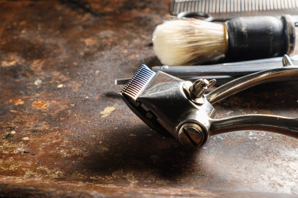 istock On a rusty surface are old hairdresser tools. comb, hairdressing scissors. rustic. horizontal . copy space. 1264066233