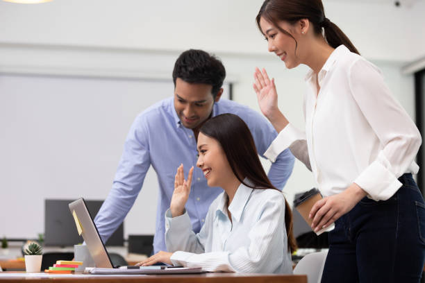 istock Business asian woman happy working job on laptop in office. 1264067708