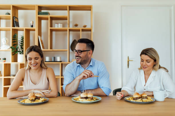 istock Coworkers having fun on lunch break, portrait. 1264068023