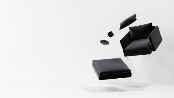 istock levitating black armchair in front of the empty white background wall, abstract background concept 1264068357