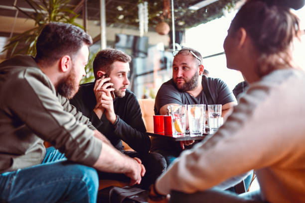 istock Friends Enjoying Coffee Time Together 1264068794