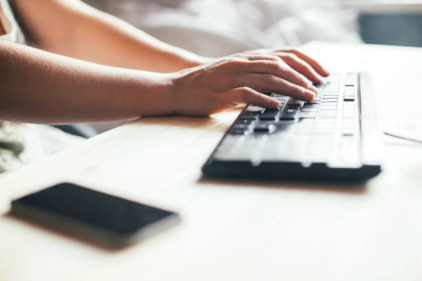 istock Closeup of a female hands busy typing on a computer. 1264073631