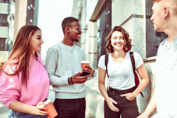 istock Students Drinking Coffee And Enjoying A Walk After School 1264073900
