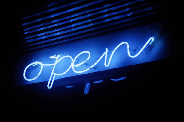 istock Blue neon open sign illuminating under the dark 1264076651