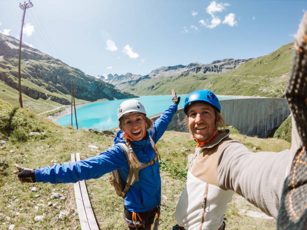 istock Couple taking selfie on Via Ferrata 1264078336