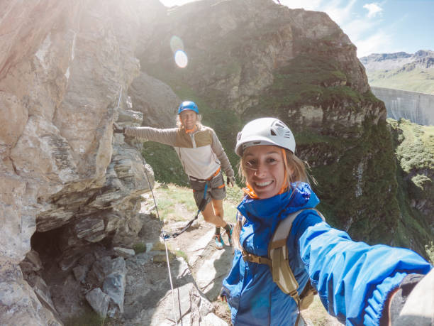 istock Couple taking selfie on Via Ferrata 1264078368