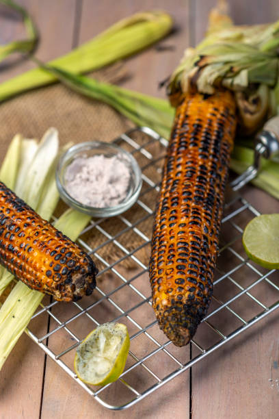 grilled sweet corn with lime and salt famous snack of India available on roadside across the nation - grilled sweet corn with lime and salt 2590 stock pictures, royalty-free photos & images