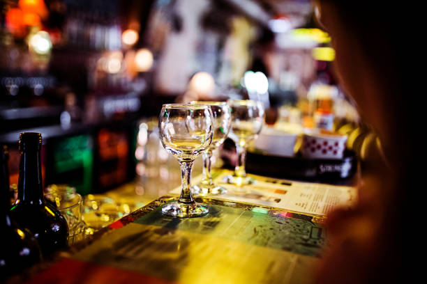 Close up of empty champagne glasses on a table.