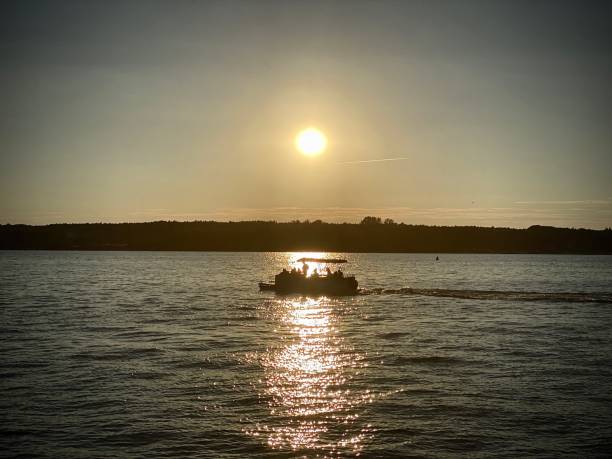 istock Sunset on a lake in Poland 1264079724