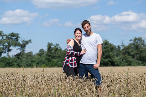 istock Friends in the wheat field. 1264084543