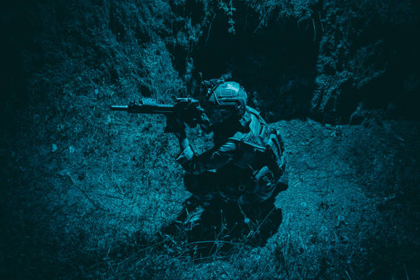 istock Combatant hiding from enemy fire in trench 1264085215