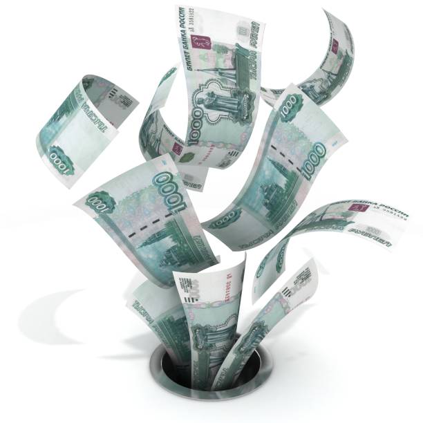 dinheiro do rublo russo caindo pelo ralo - money down the drain - fotografias e filmes do acervo