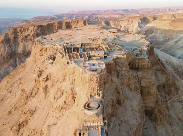Aerial view of the ruins of Massada is a fortress built by Herod the Great on a cliff-top off the coast of the Dead Sea. Destroyed by the Romans in the 1st century AD e. Included in the UNESCO World Heritage List