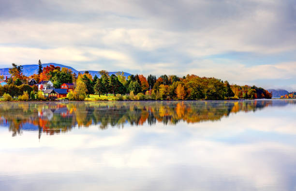 Landscape with Trees in Autumn Colors, Hudson River, Catskill Mountains, Mount St. Alphonsus Seminary, located in Town of Esopus in Ulster County and Blue Sky in Background, Hyde Park, Dutchess County, Hudson Valley, New York, USA.  Canon EOS 6D Full Frame Sensor Camera, Canon EF 70-200mm F/4L IS lens.