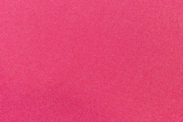 istock Red color fabric clothes textured background 1264098120