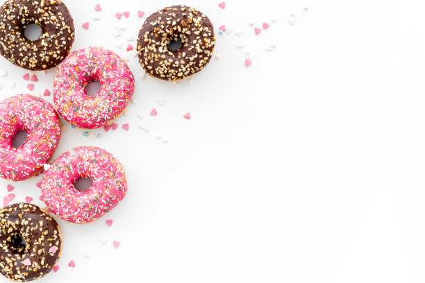 istock Top view of colorful glazed donut swith sprinkles, copy space 1264098470