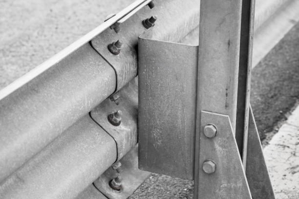 istock Gray metal guardrail construction mounted on a highway 1264100142