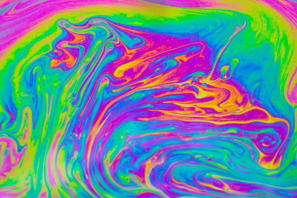 istock Psychedelic multicolored patterns background. Photo macro shot of soap bubbles 1264101493