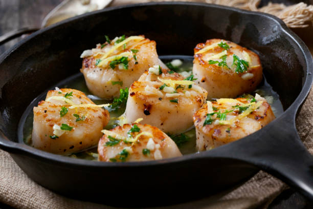 Scallops Poached in a Butter and Garlic Sauce