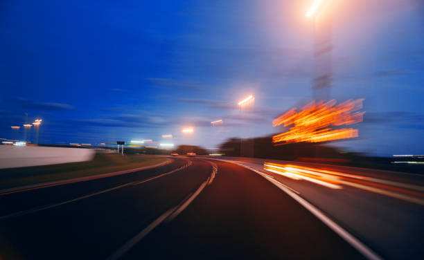istock Driving at night long exposure on the highway 1264104142