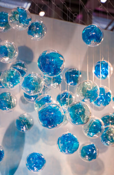 istock Blue glass bubble decoration tied rope hanging on ceiling 1264106305