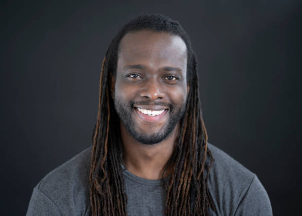 istock Headshot of confident 32 year old black man with dreadlocks 1264106974